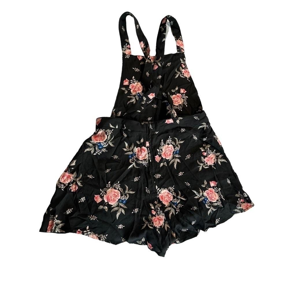 Divided women's size 8 black floral short overalls, inseam 2", length 28"